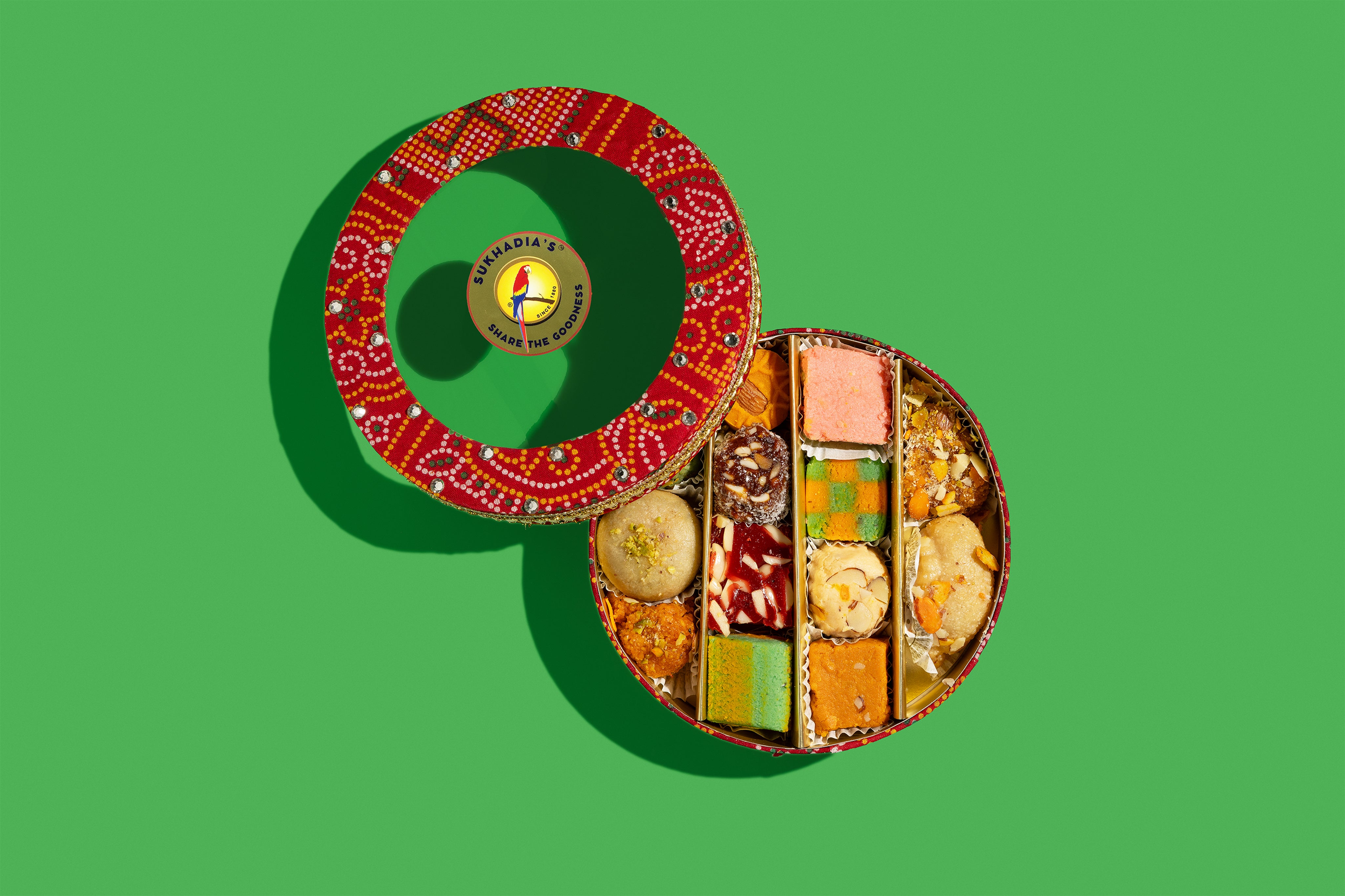 Red Bandhani and Gold Sweets & Nuts Round Combo